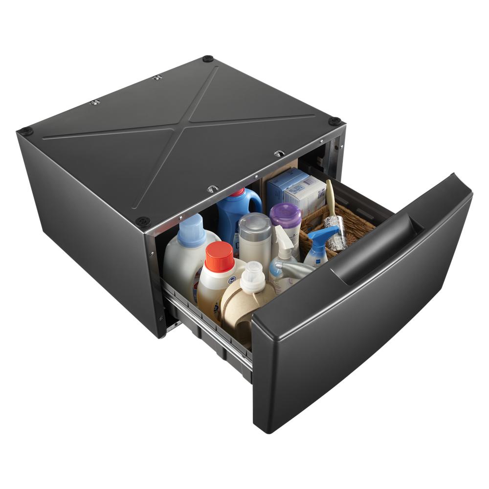 Dark-colored laundry pedestal drawer open showing detergent and cleaning supplies in appliance parts and accessories collection