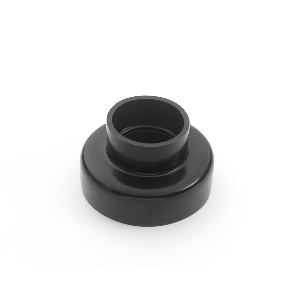Black plastic reducer cuff for pipe fitting in home improvement and plumbing applications