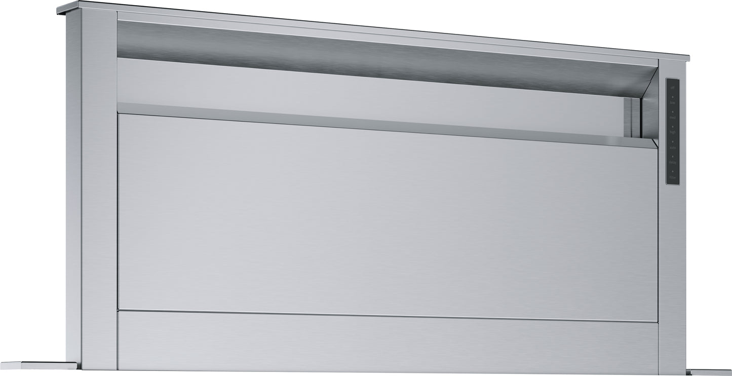 stainless steel downdraft ventilation integrated into countertop with digital control panel in kitchen appliances collection