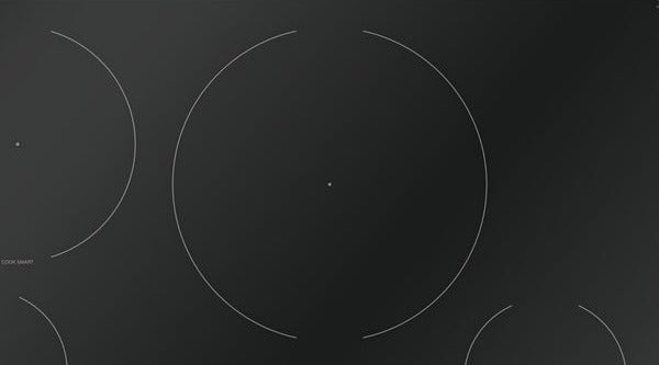 Black induction cooktop without frame featuring multiple cooking zones with minimalist design, part of Thermador appliances and kitchenware collections.