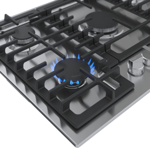 Close-up of stainless steel 30-inch gas cooktop burner ignited with blue flame, featuring cast iron grates in kitchen setting