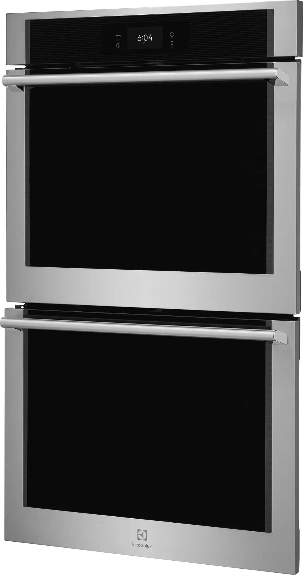Electric double wall oven with stainless steel frame and digital touch display in modern kitchen appliance setting