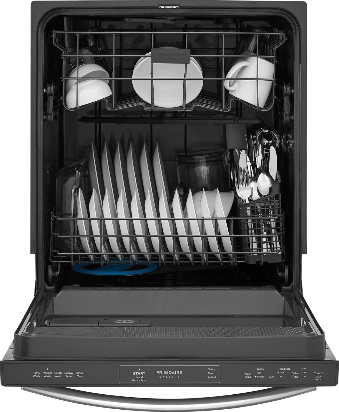 Open dishwasher interior loaded with plates, cups, and utensils in sturdy racks for kitchen appliance use