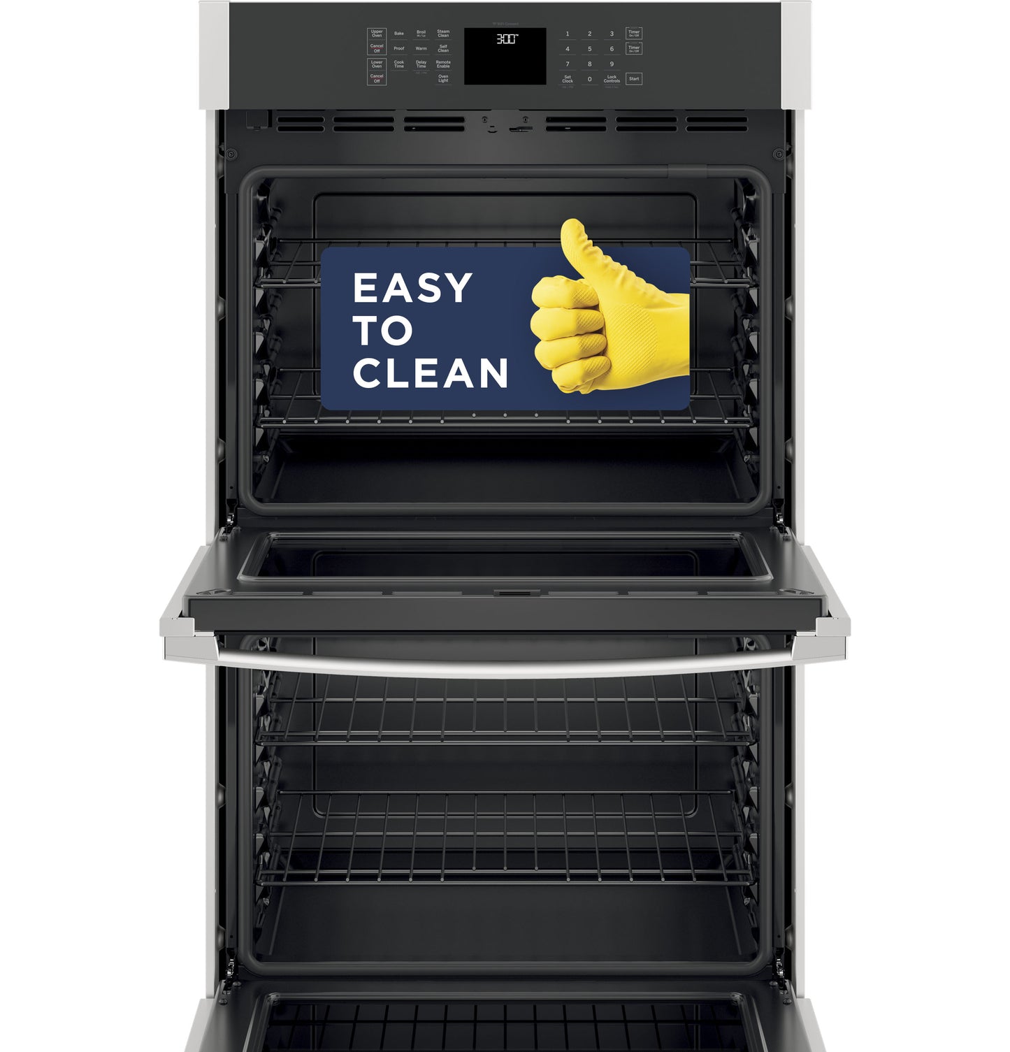 Open modern double wall oven with "Easy to Clean" sign inside in kitchen appliance setting