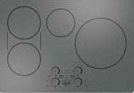 Black built-in induction cooktop with touch controls and multiple heating zones for kitchen and appliance collections