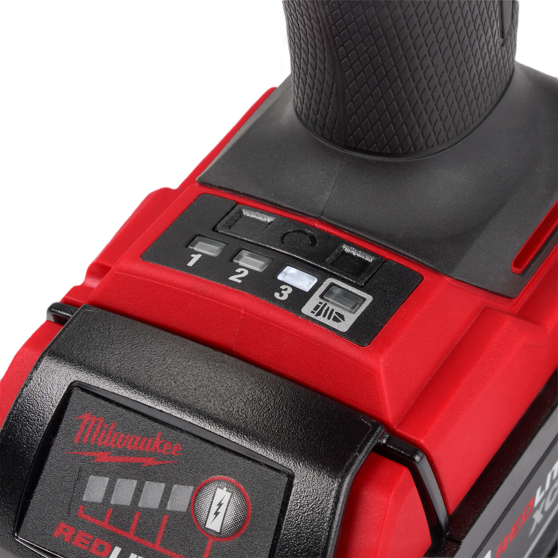 Red and black cordless impact driver with textured grip and variable speed settings for tools and home improvement tasks