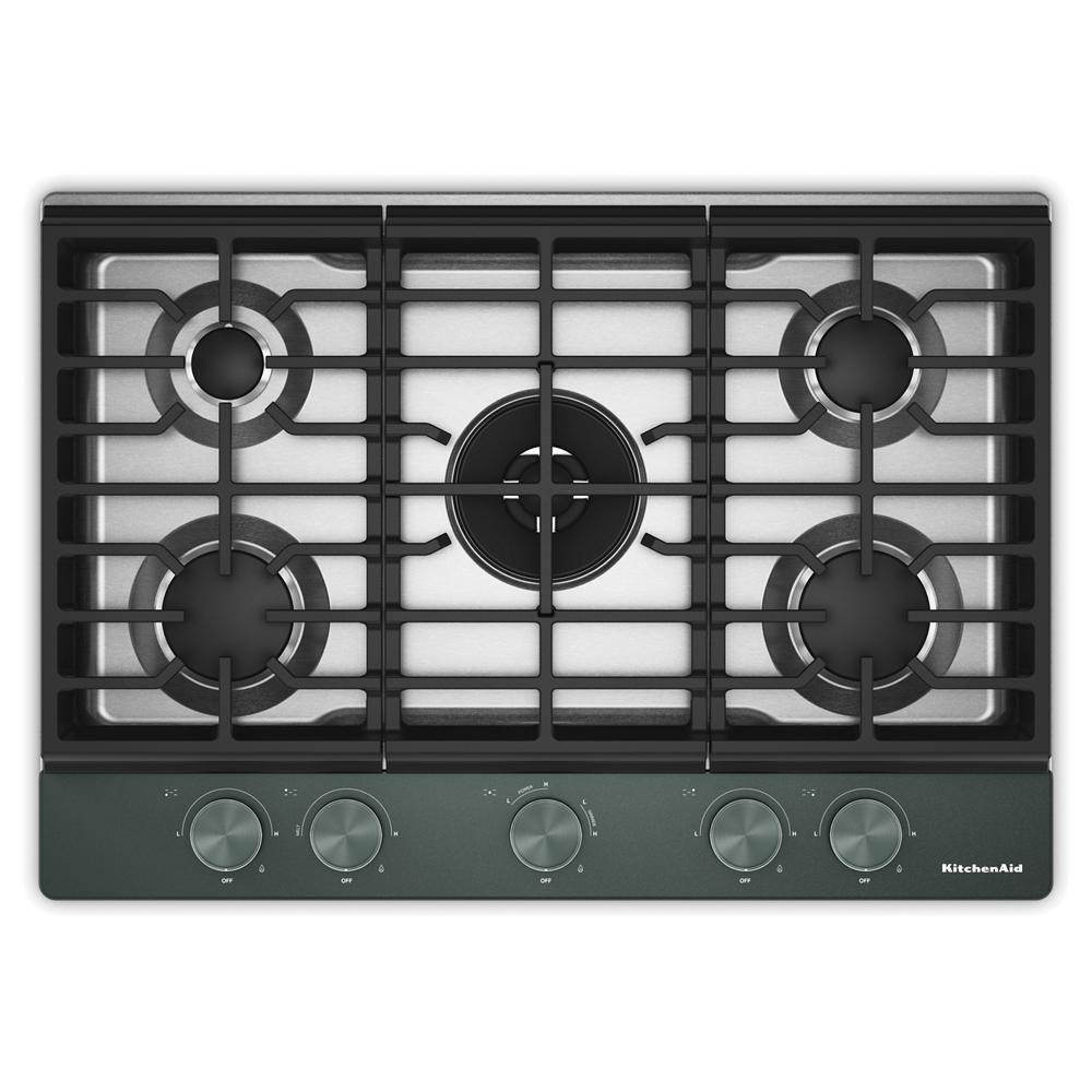 Top view of a stainless steel gas cooktop with five burners, integrated wok grate, and five control knobs, part of Cooktops and Kitchen & Kitchenware collections for home improvement.