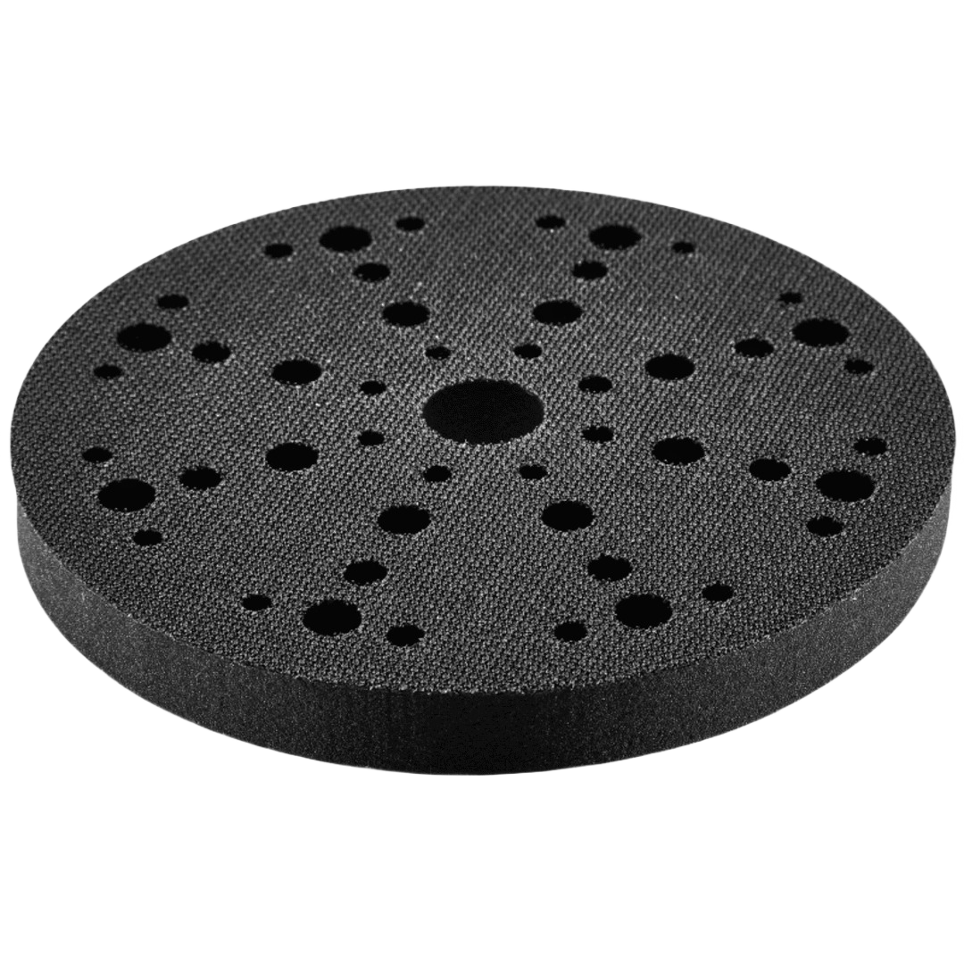 Round black interface sander backing pad with multiple perforations for dust extraction in home improvement tools