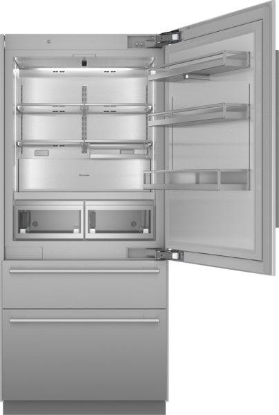 Open built-in stainless steel refrigerator with spacious interior and adjustable shelving from Thermador appliances collection