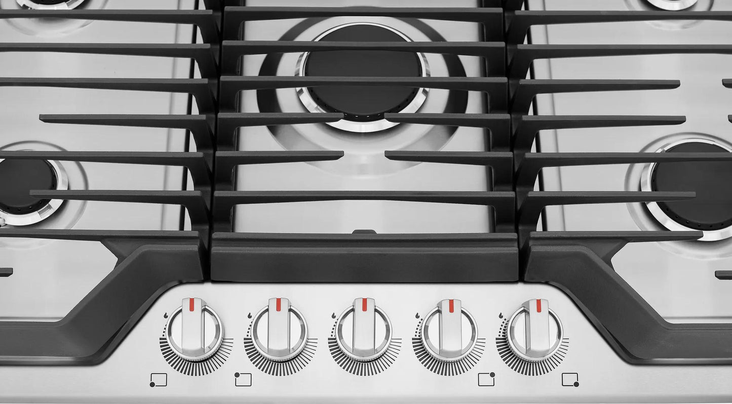 Stainless steel cooktop with five burners, front control knobs, and continuous cast iron grates in kitchen appliances collection