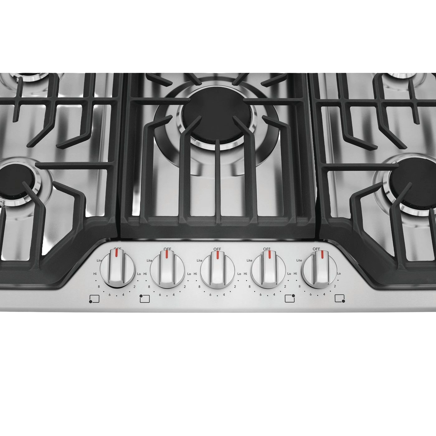 Close-up of a stainless steel cooktop with five burners and metal control knobs in kitchen appliance collection