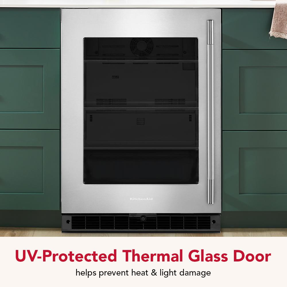 Undercounter refrigerator with stainless steel frame, UV-protected glass door, and ventilation grille in kitchen setting