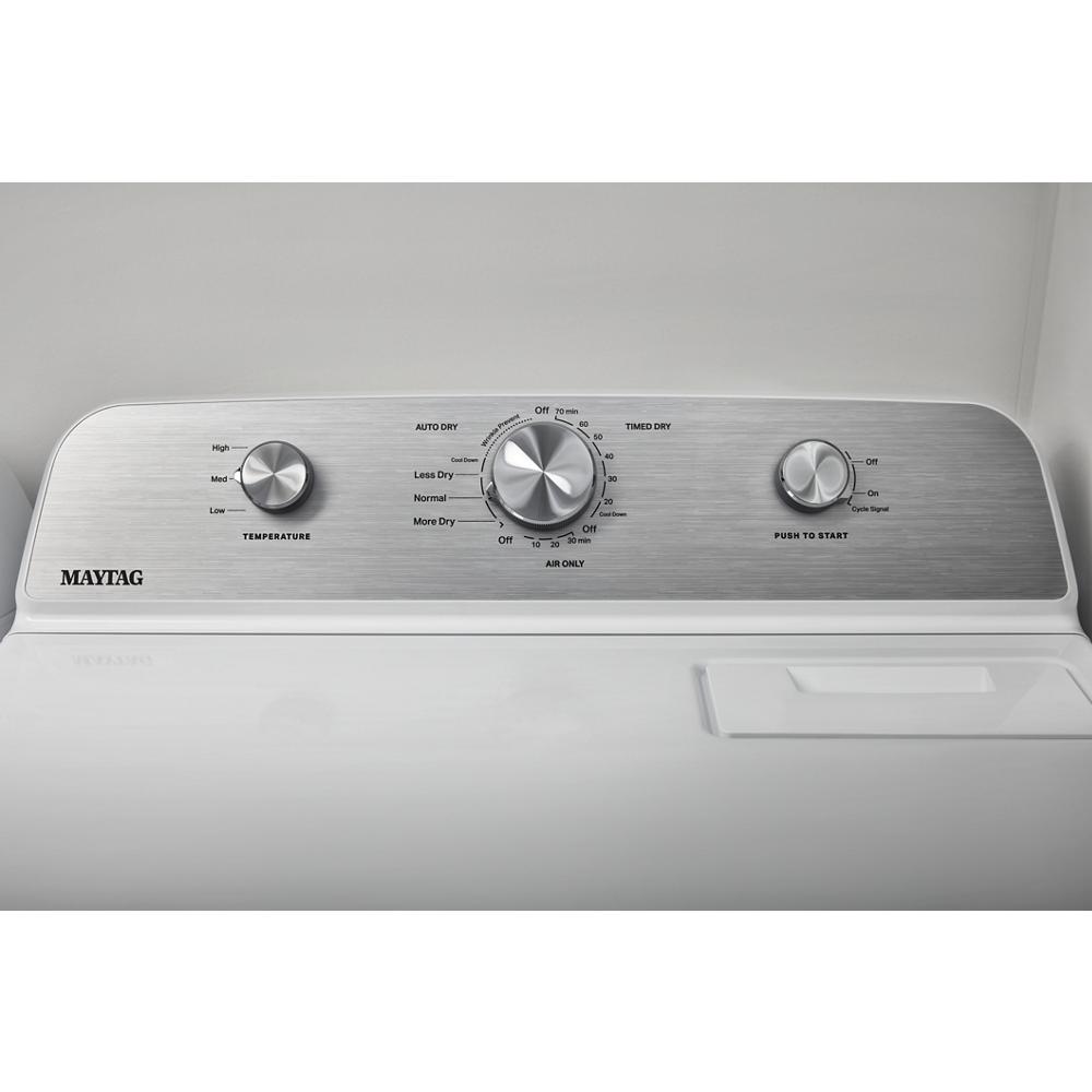 Close-up of a silver control panel with three knobs on a Maytag top load dryer in Dryers and Appliances collections