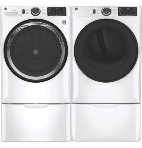 Pair of white modern front-load washer and dryer units with digital displays in washers and dryers collection