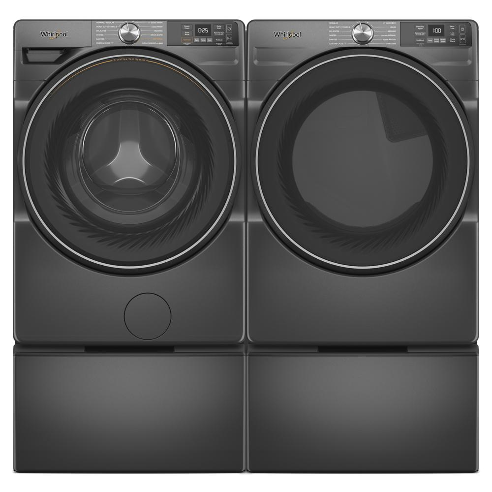 Front load washer and dryer set in dark finish with matching storage pedestals in laundry appliance parts collection