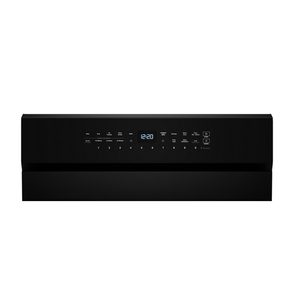 black gas range control panel with digital clock and touch buttons in kitchen appliances collection