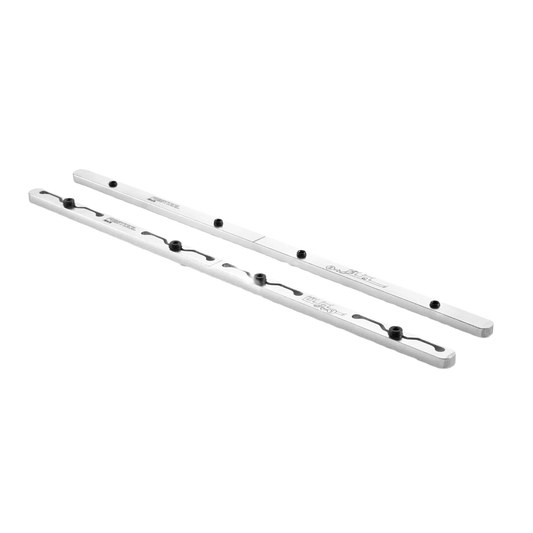 Pair of silver metallic guide rail connectors with black fastening knobs for woodworking and power tool accessories.