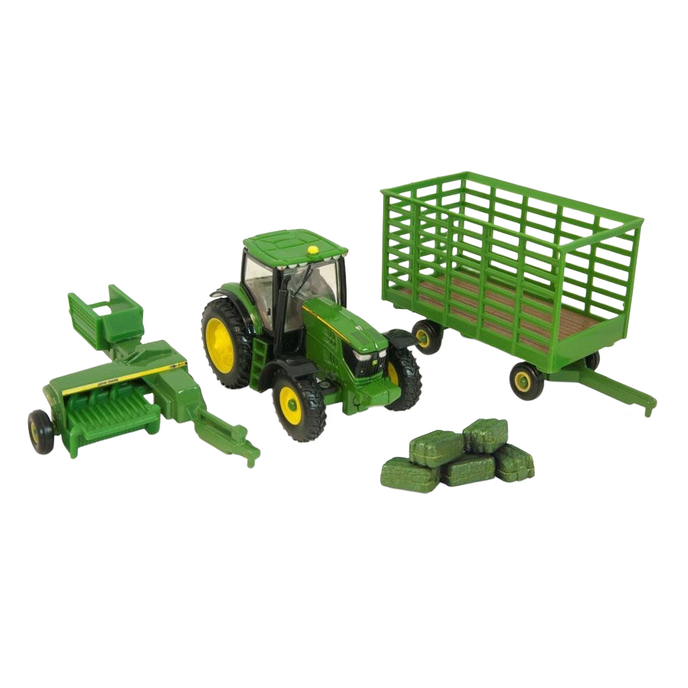 Green toy tractor with square baler, bale wagon, and miniature green hay bales farm playset