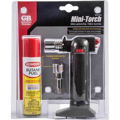Compact butane torch kit with black textured handle, red ignition button, and included precision soldering tip and fuel canister
