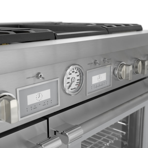 Stainless steel dual fuel range control panel with knobs, digital displays, and temperature gauge in kitchen appliances collection