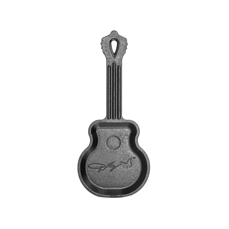 Cast iron mini skillet shaped like a guitar featuring engraved signature details for unique kitchen use.