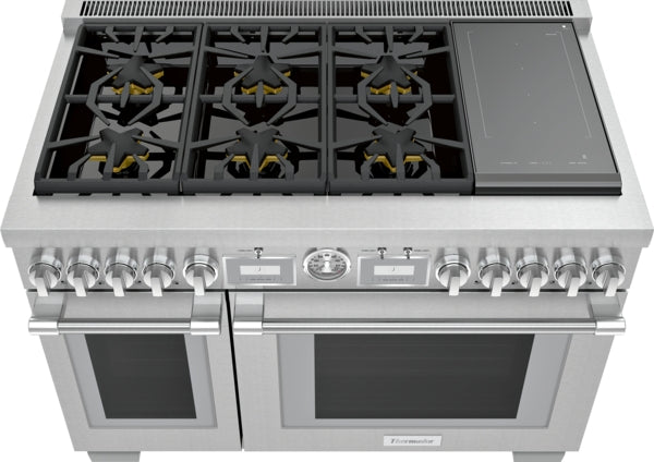 Commercial depth dual fuel range with six gas burners, induction cooktop, dual ovens, and stainless steel finish from Thermador collections