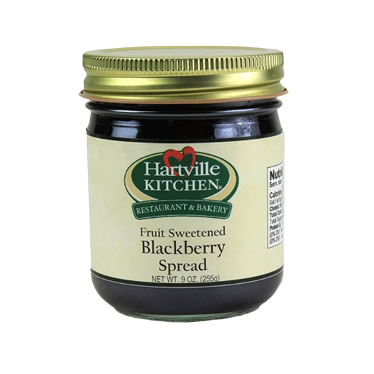 Glass jar of Hartville Kitchen blackberry fruit spread naturally sweetened with white grape juice concentrate in jams & jellies collection