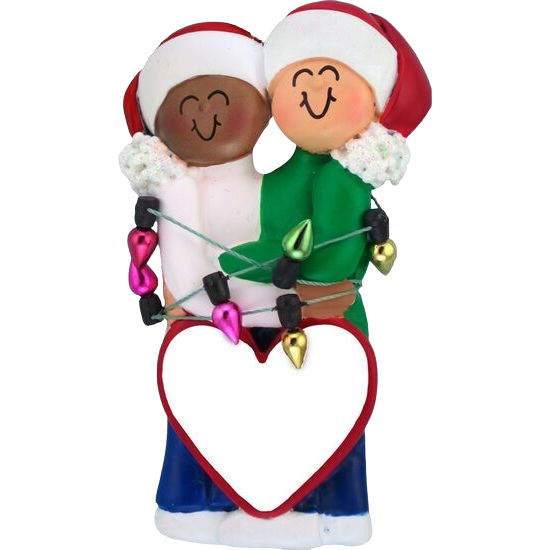 Interracial Christmas couple ornament in Santa hats holding colorful holiday lights and heart decoration under 50 dollars