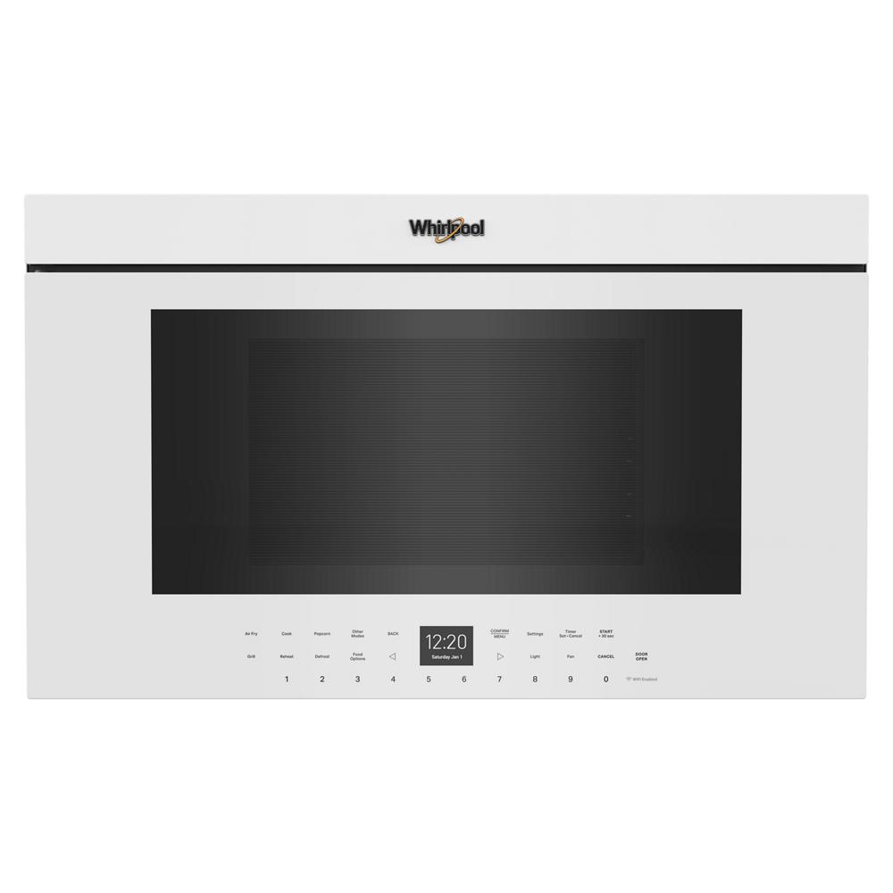 White Whirlpool air fry over-the-range microwave with flush built-in design and digital control panel for kitchen appliances collection