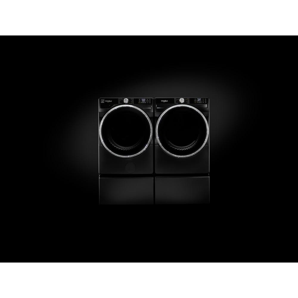 Black smart front load washer and dryer pair with digital display and control knobs from washers and appliances collection