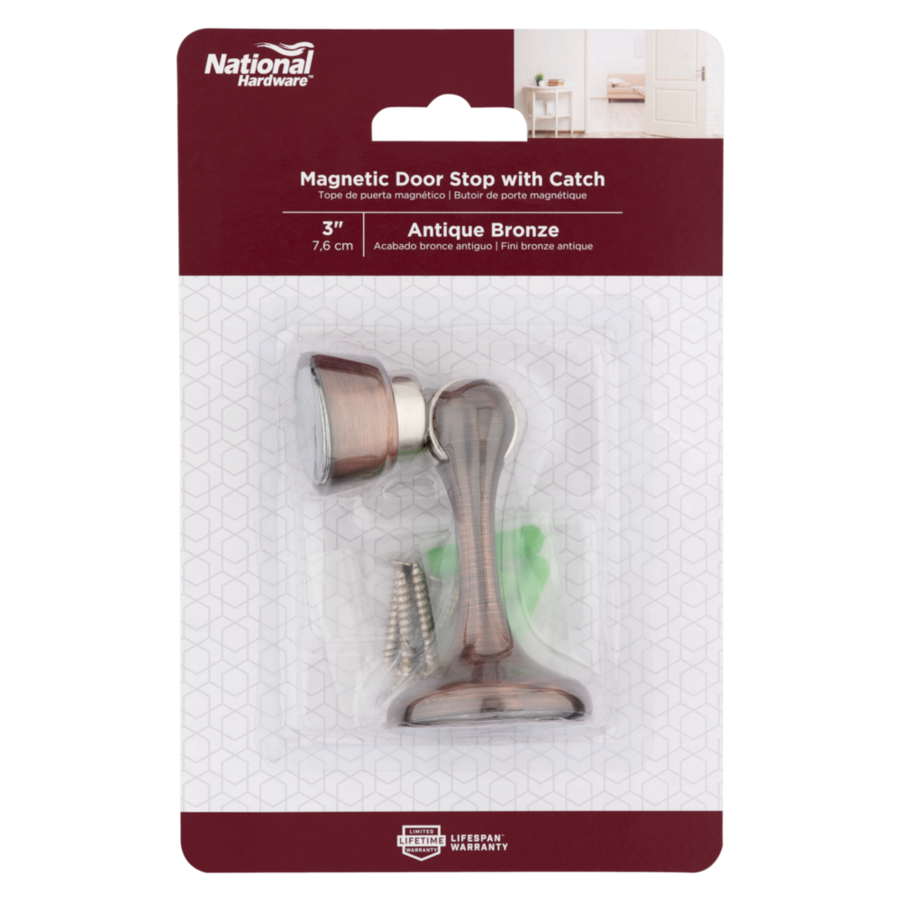 Antique bronze magnetic rigid door stop with catch, screws, and green wall anchors for home improvement tools