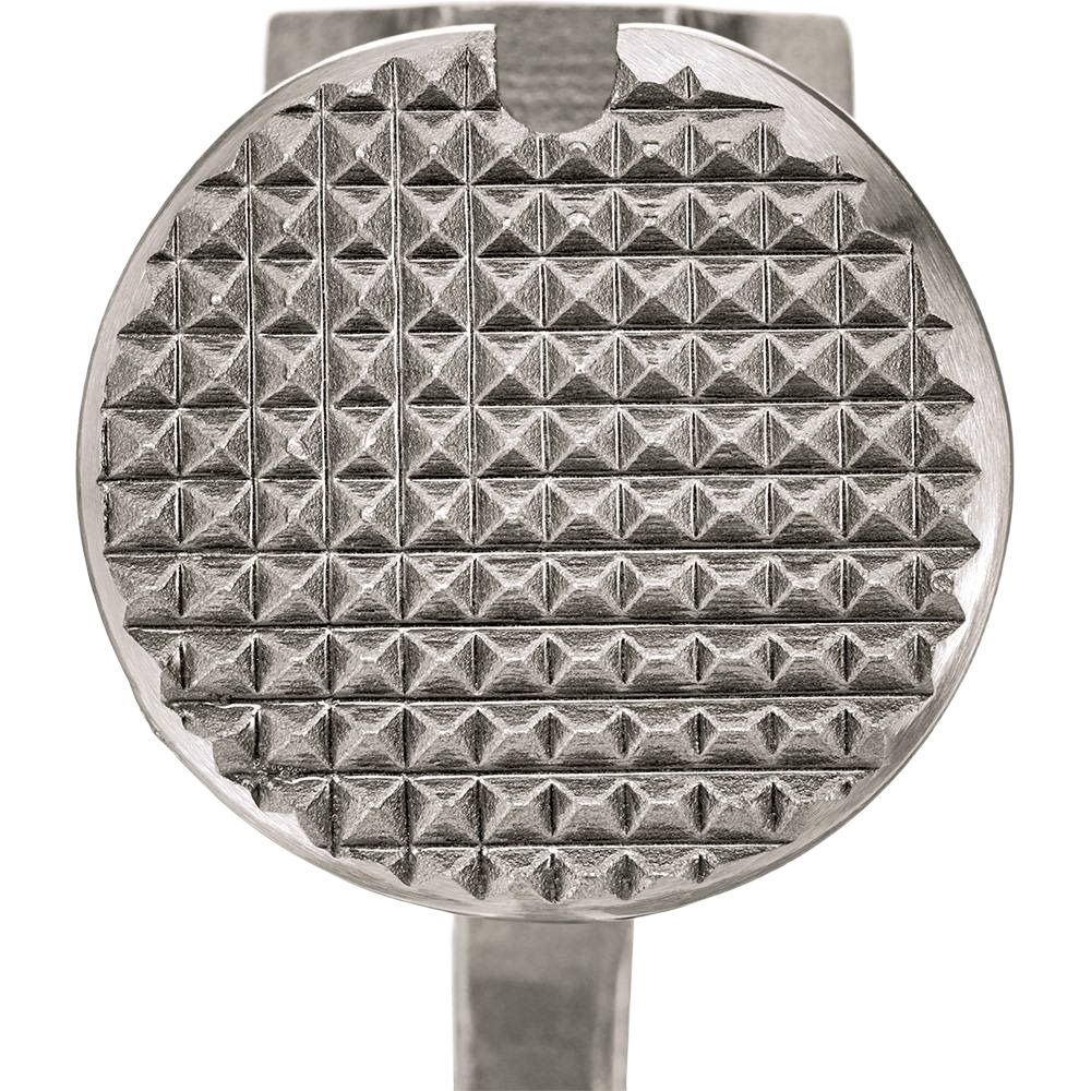 Close-up of textured milled face of steel framing hammer for improved grip in home improvement tasks