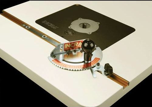Metal miter channel attached to a woodworking table with angle adjustment gauge for precise cuts in home improvement projects