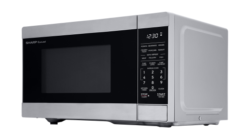 Compact countertop microwave oven in stainless steel with digital keypad, preset cooking functions, and LED display for kitchen appliances and home improvement.