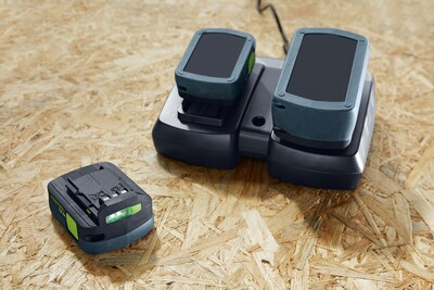 Dual battery charger with two compact rechargeable lithium-ion batteries for cordless drill use in tools and home improvement