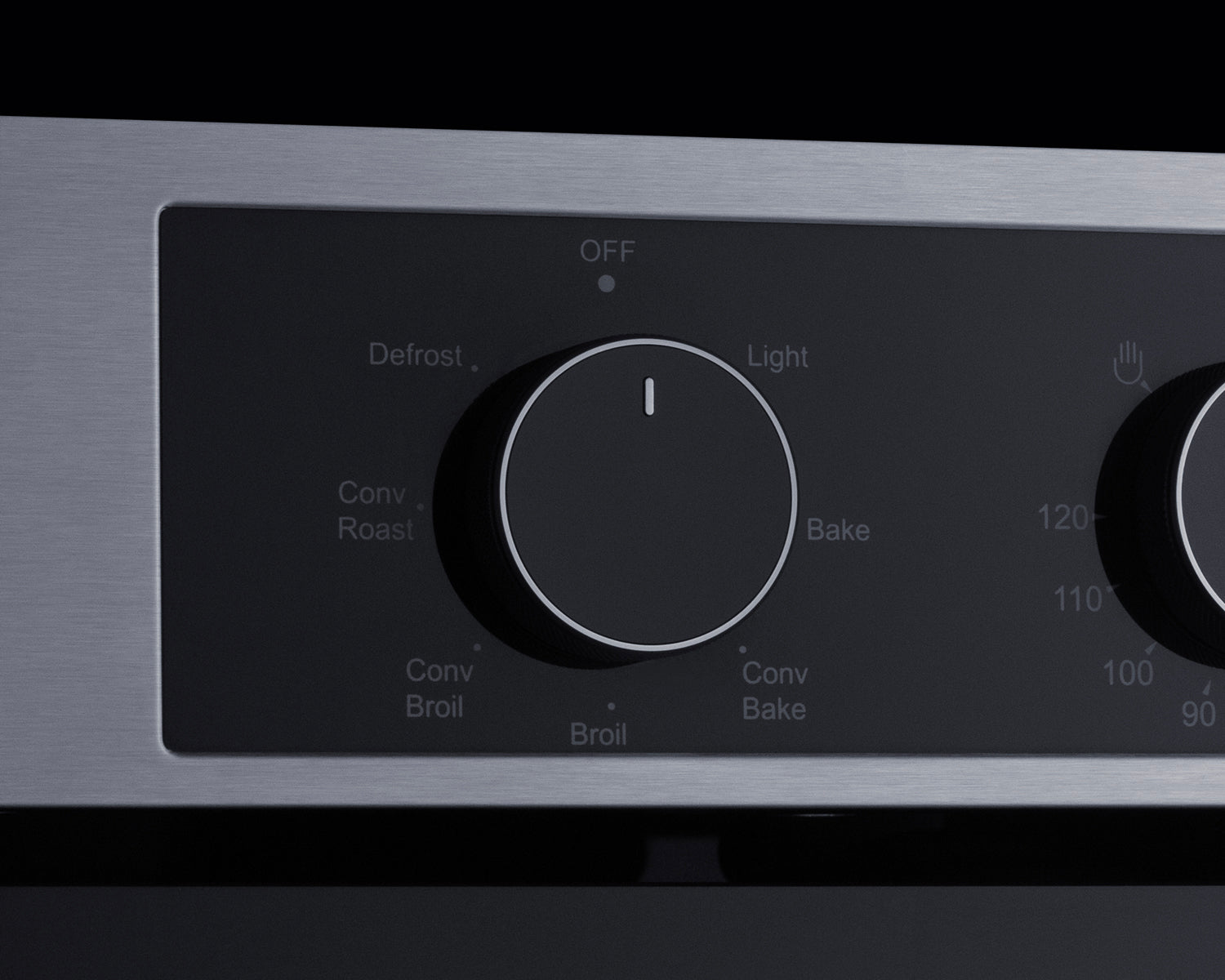 Close-up of stainless steel electric wall oven dial with cooking mode options from Kitchen & Kitchenware collection