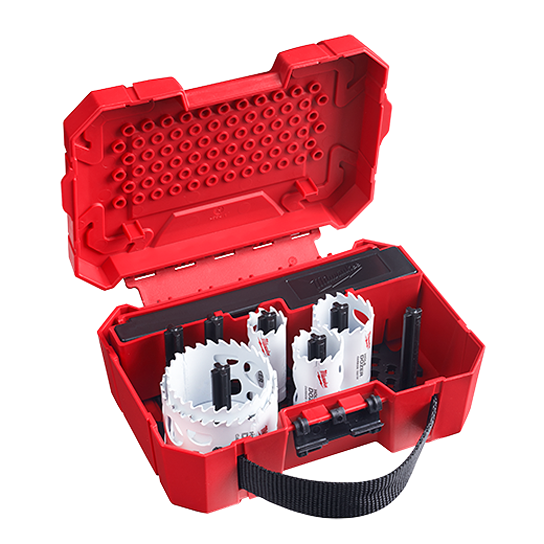 Red portable case with white carbide teeth hole saws organized inside for tools and home improvement use