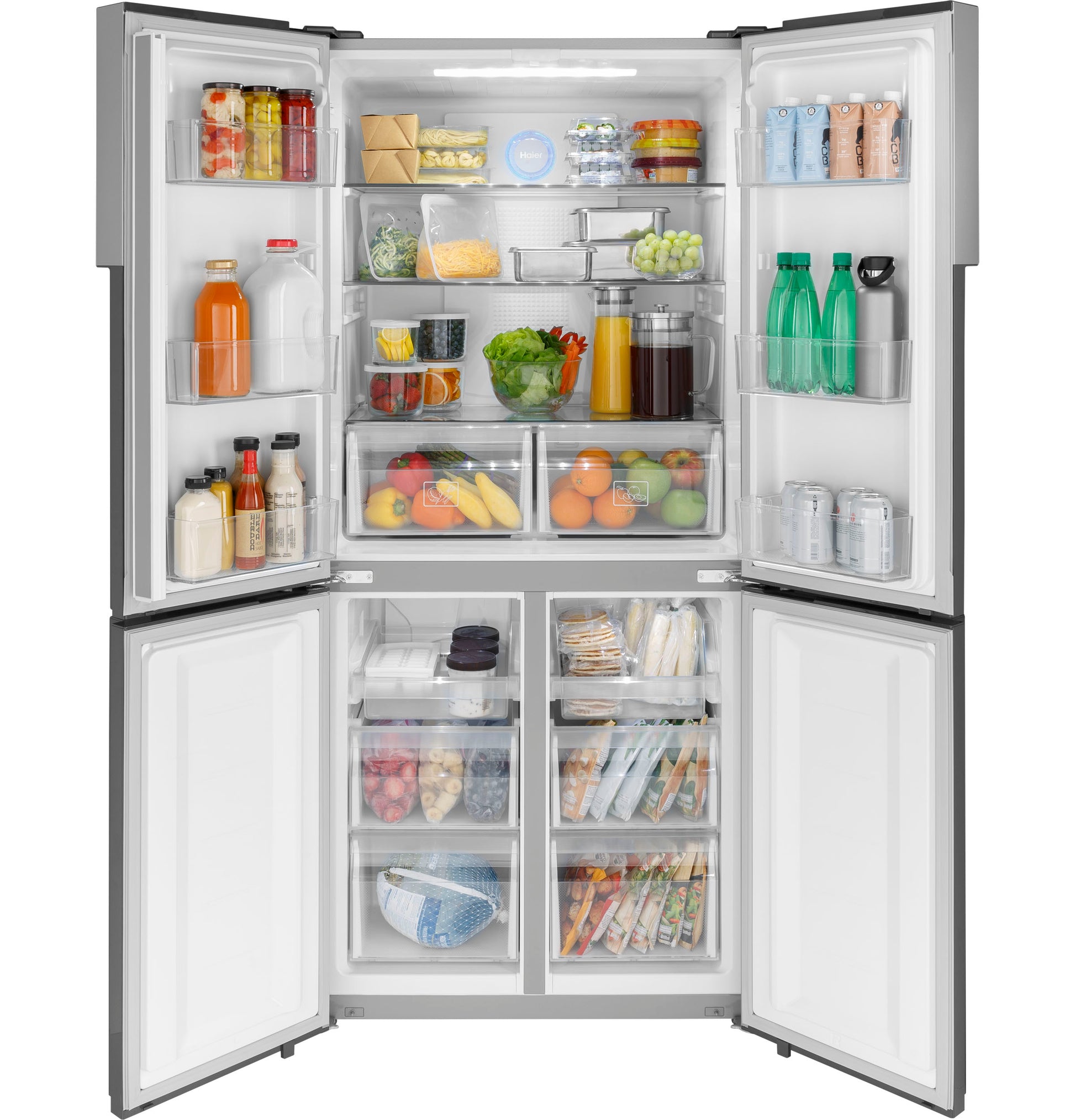 Open quad door refrigerator with organized fresh produce and beverages in kitchen appliances and refrigerators collection