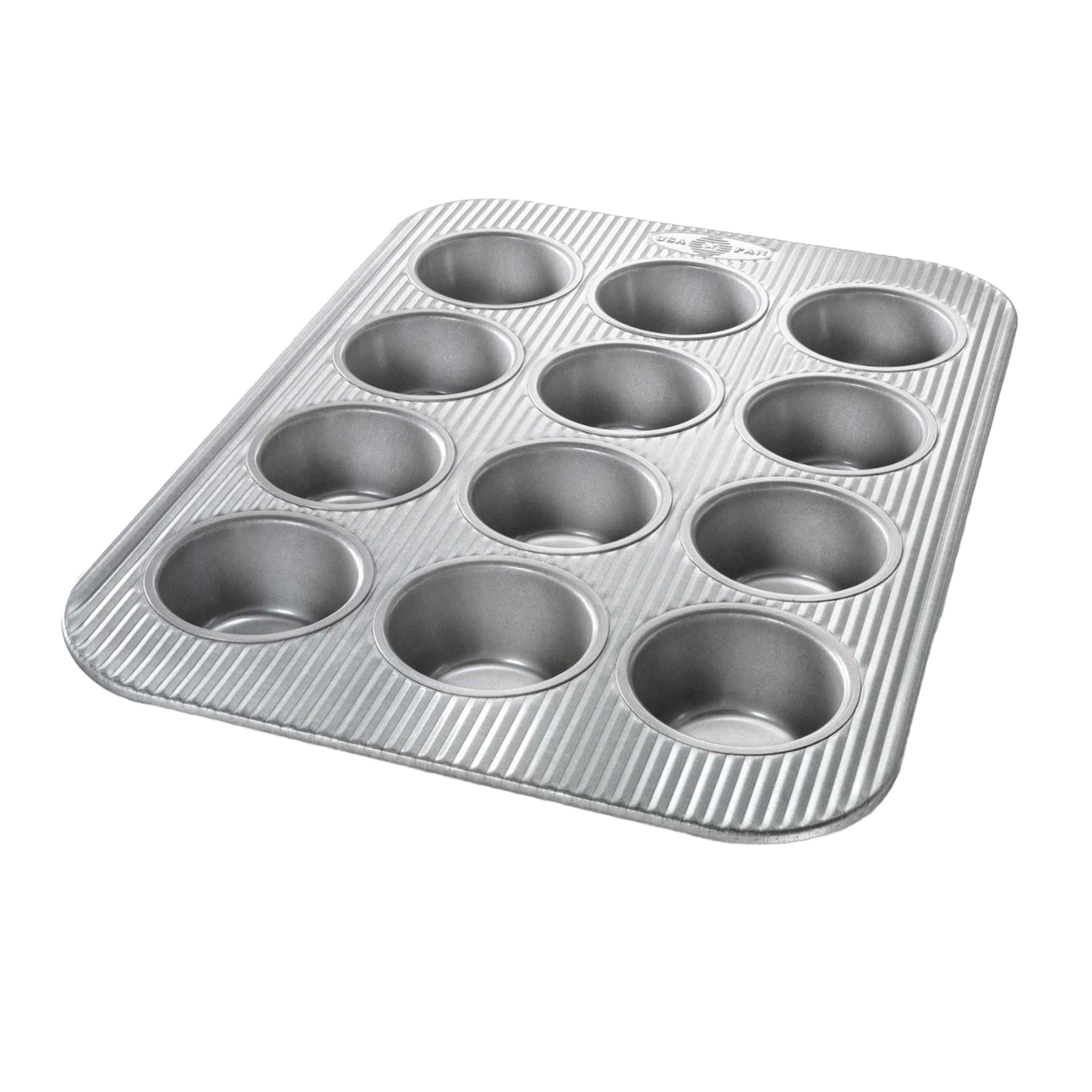 12-cup non-stick muffin pan with ribbed metal surface in Kitchenware and Bakeware collections under $50