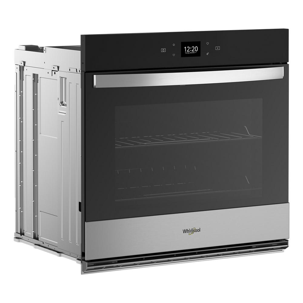 Stainless steel and black single wall oven with digital clock and handle in kitchen appliances and wall ovens collection