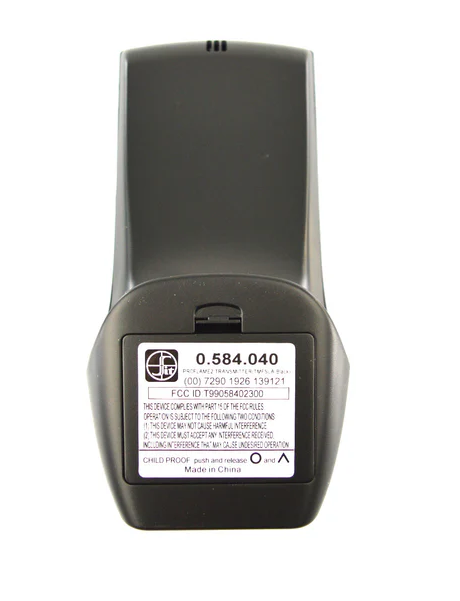 Back view of black Kozy Heat SIT Proflame 2 remote control showing compliance label for home improvement use