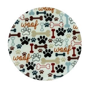 Circular silicone jar opener with multicolored dog paw prints, bones, and "woof" text pattern for kitchen gadgets collections