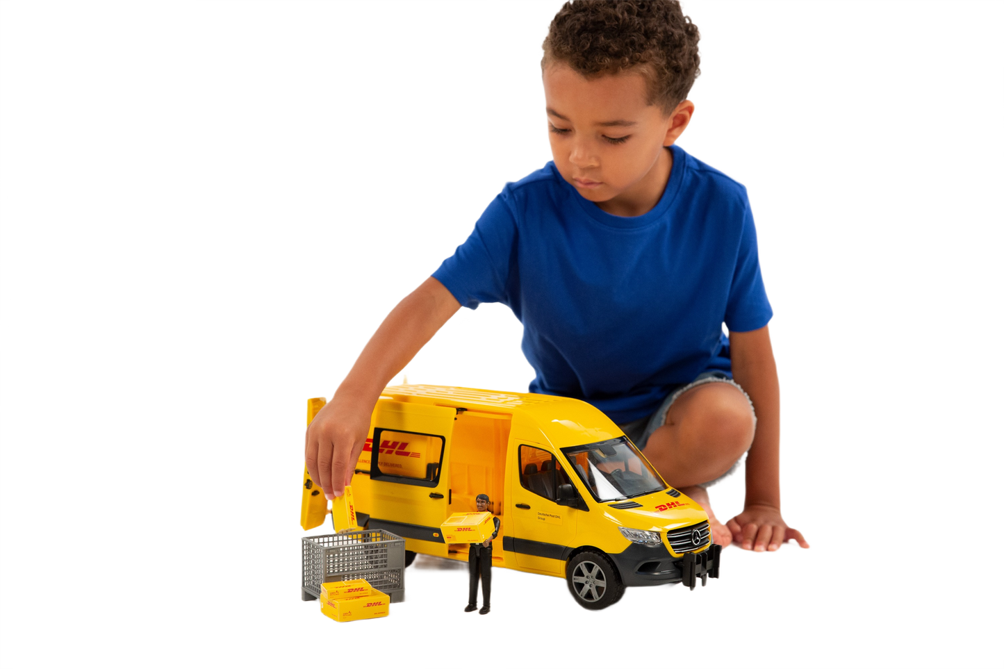 Child playing with yellow DHL Sprinter truck toy and driver figure in Vehicles & Remote Controlled Toys collection