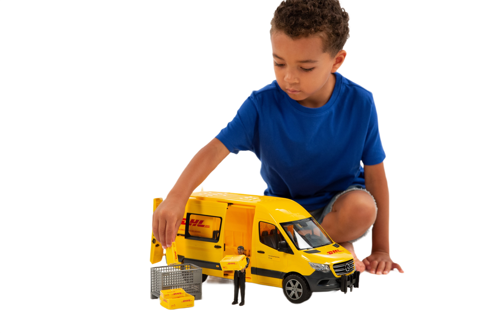 Child playing with yellow DHL Sprinter truck toy and driver figure in Vehicles & Remote Controlled Toys collection