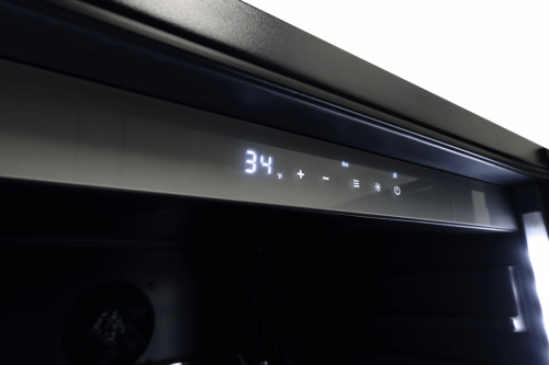 Digital control panel with temperature and settings icons on a stainless steel beverage center from kitchenware and appliances collections