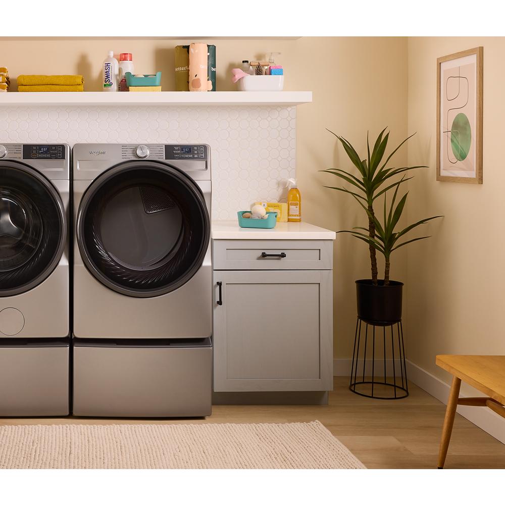Front load smart electric dryer and matching washer in stainless steel with home laundry setup in Dryers collection