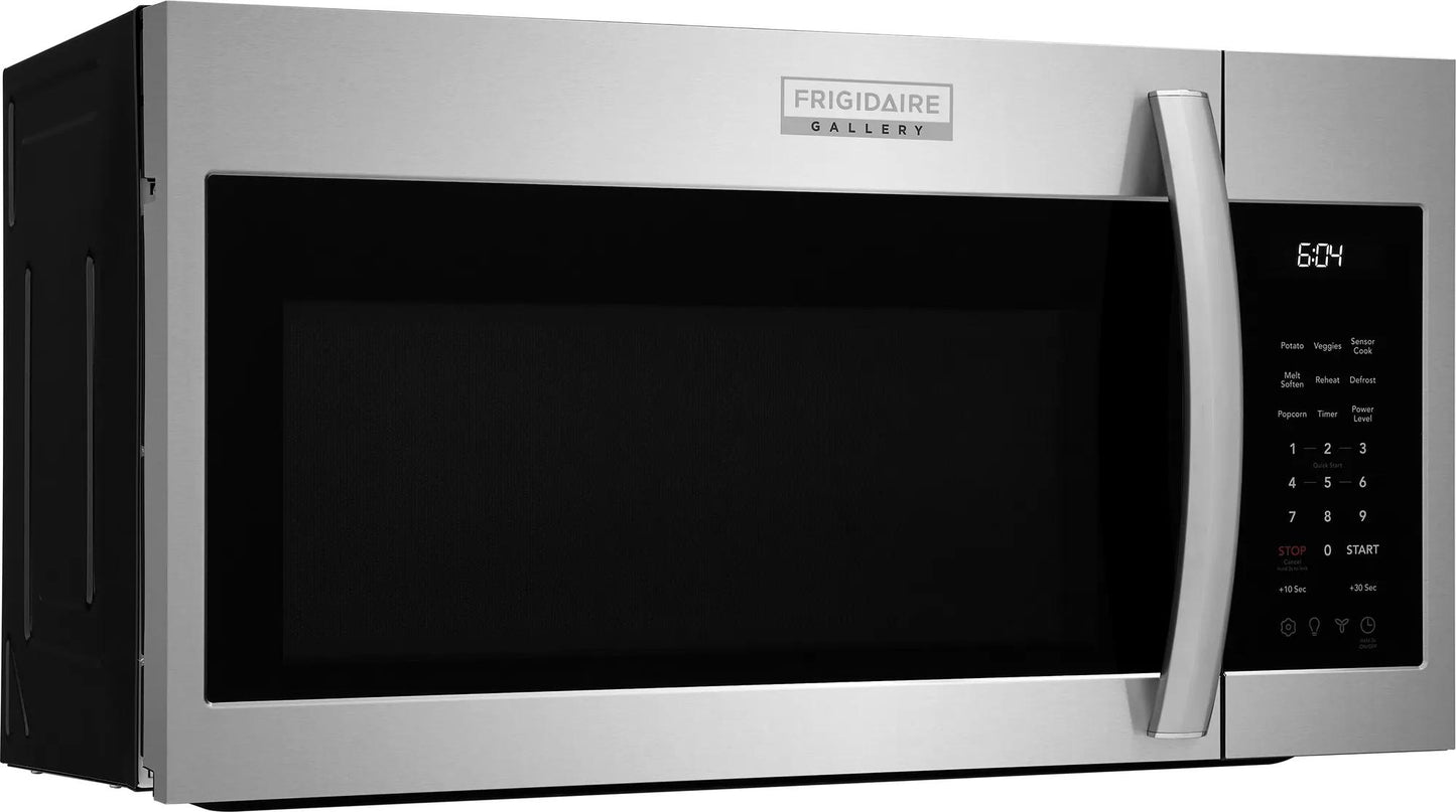 Stainless steel over-the-range microwave with digital control panel and sleek handle in modern kitchen appliance setting