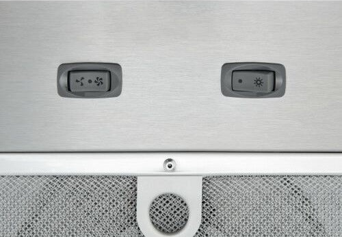 Close-up of stainless steel power pack insert control switches for fan speed and LED lighting in kitchen appliances collection