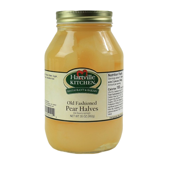 Glass jar of pear halves preserved in syrup with a metal screw-top lid and Hartville Kitchen label