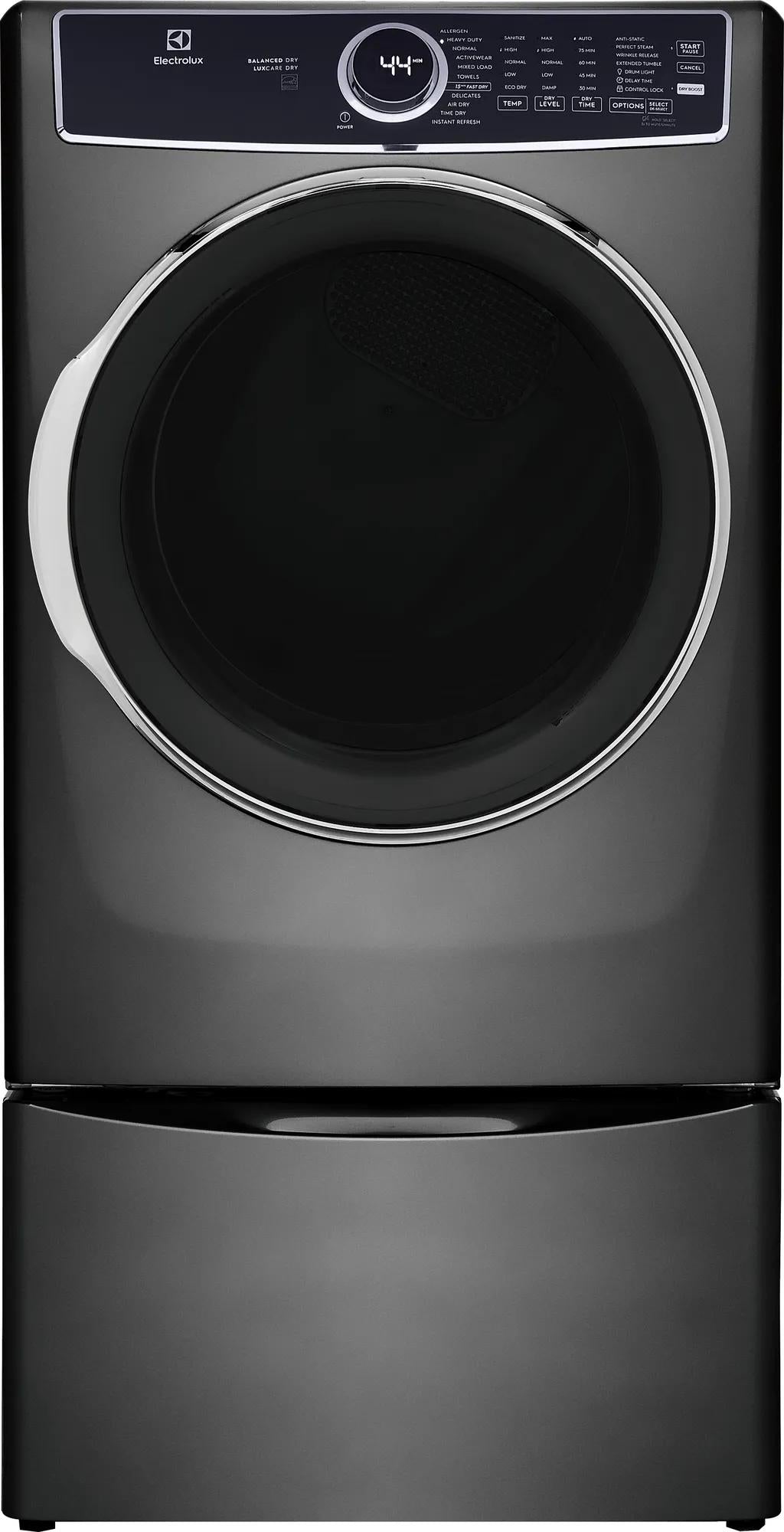 Black front load electric dryer with digital display and chrome-trimmed door in modern home appliance setting